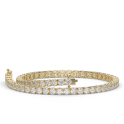 3 Carat Yellow Gold Round Shape Diamond Tennis Bracelet With Prong Setting.